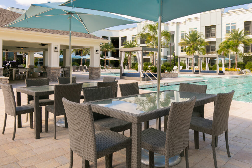 Tables near a swimming pool