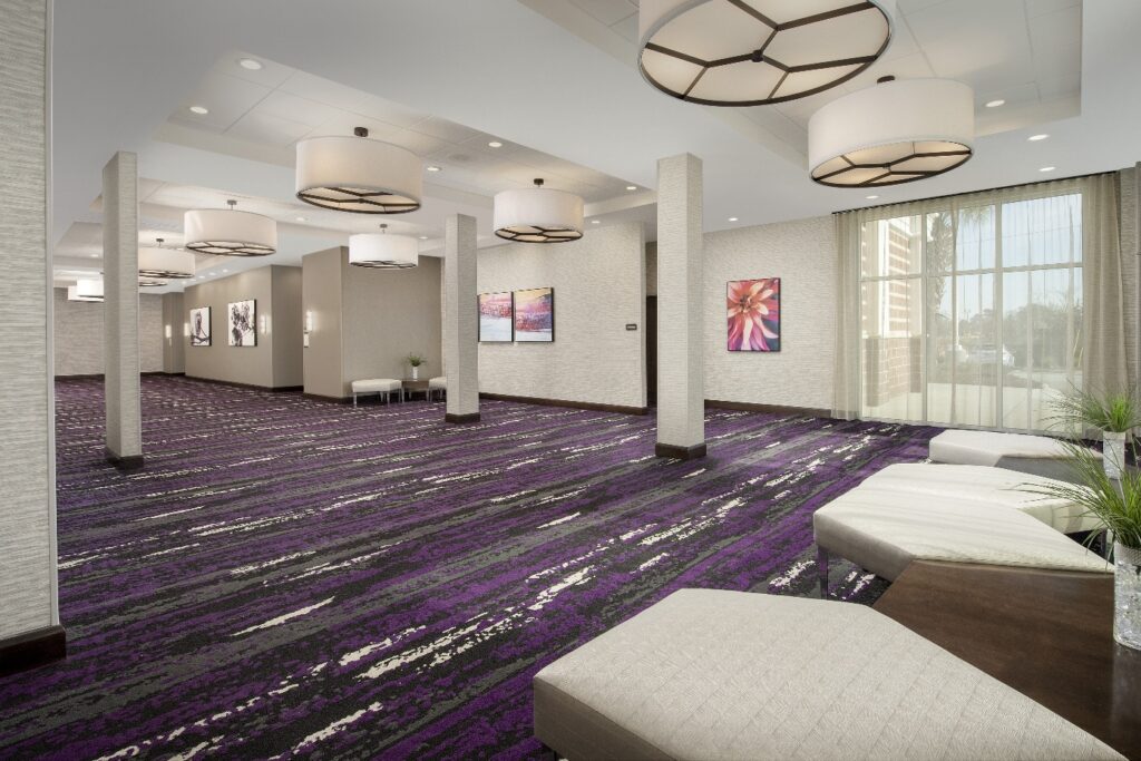 A function hall with violet carpet